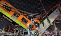 مصرع 15 شخصا واصابة العشرات جراء انهيار جسر لحظة مرور قطار أنفاق في المكسيك